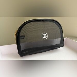 New, unused CHANEL Black Mesh Cosmetic Pouch. GWP